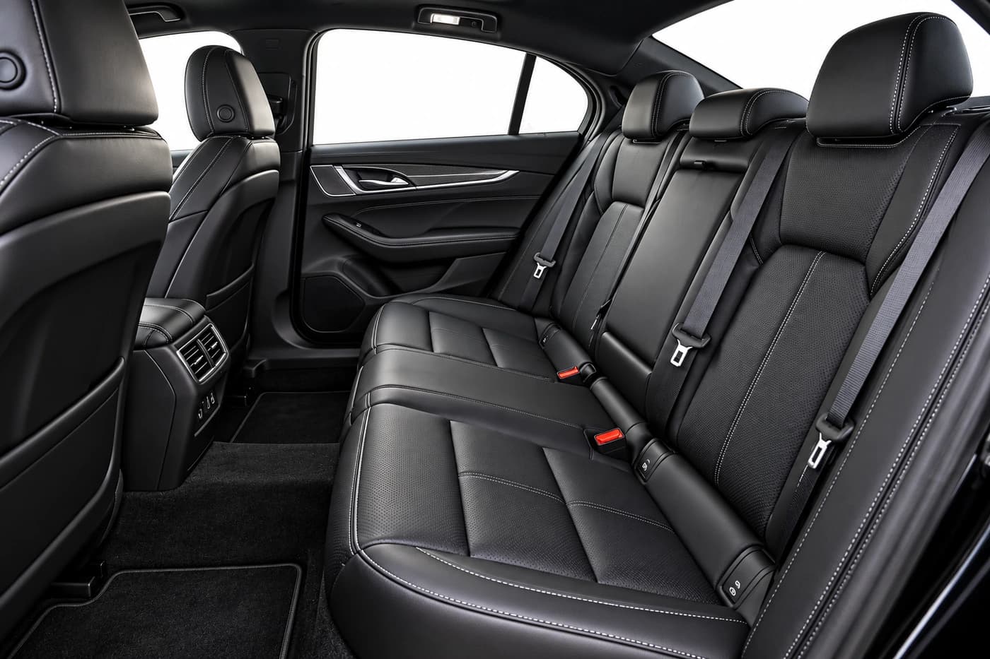 Cadillac CT5 rear bench seat in perforated black leather with contrast stitching.